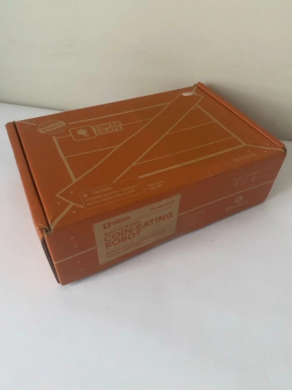 KiwiCo Coin-Eating Robot Tinker Crate kit. Recommended ages 9+.